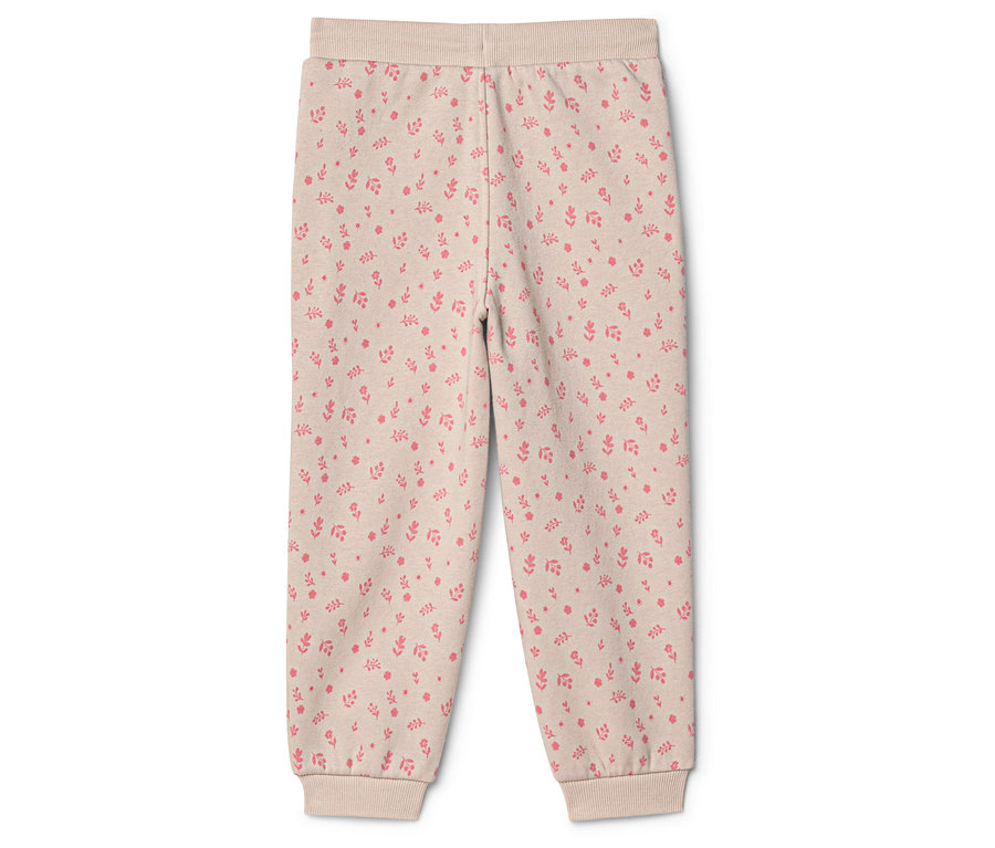 Beige Hose mit rosa Blumenmuster, Bündchen an Taille und Knöcheln.
