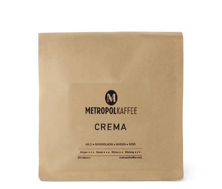 Eine Packung METROPOL KAFFEE - CREMA - 500 g Ganze Bohne. Die Packung ist braun.
