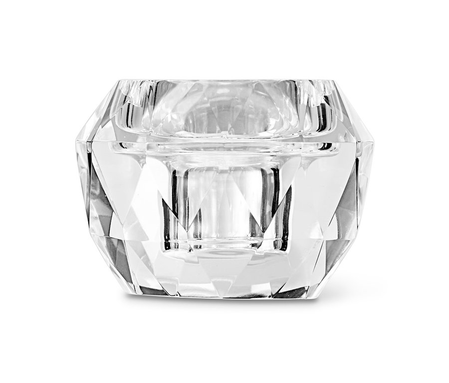 Detailaufnahme von einem der zwei Glas-Kerzenhalter mit geometrischem Design.