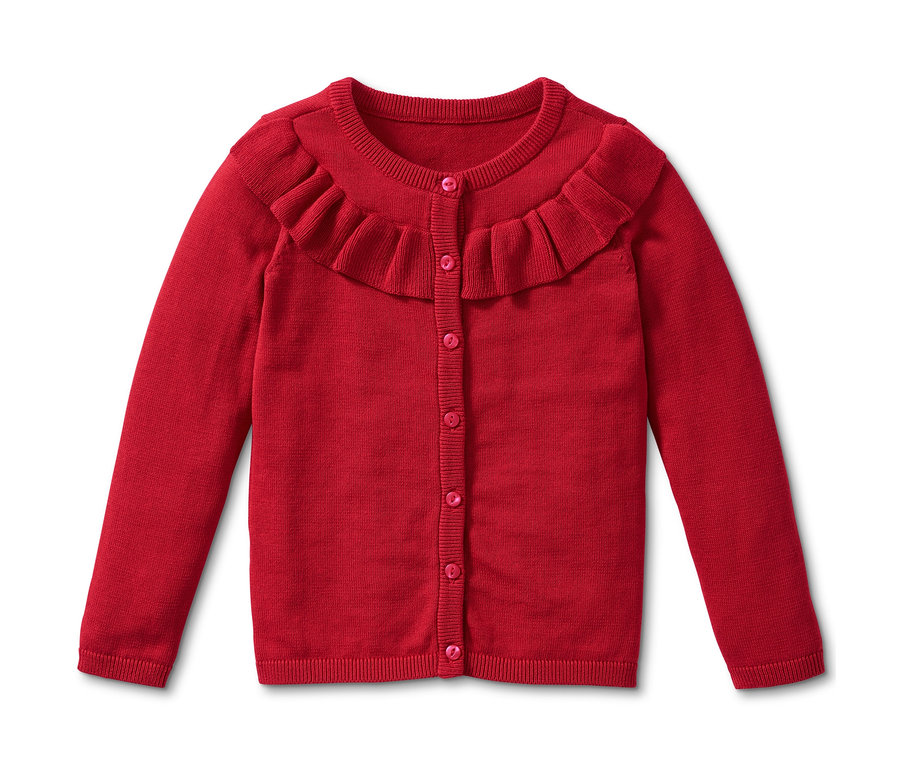 Rote Strickjacke mit Rüschen.