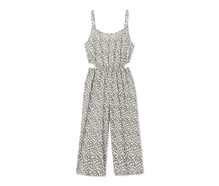 Ein Jumpsuit in 7/8-Länge mit Blumenmuster und Cut-Outs an der Taille.