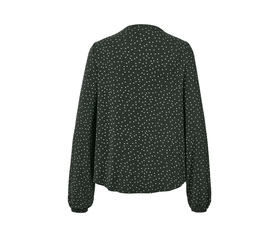 Gepunktetes Blusenshirt mit langen Ärmeln.