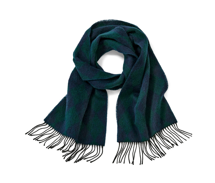 Ein blau-grüner Wollschal mit Fransen.