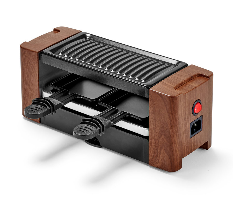 Raclette für 2 Personen mit Holzdekor und zwei Pfännchen.