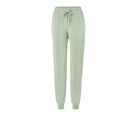 Eine hellgrüne Pyjamahose mit Kordelzug in der Taille.
