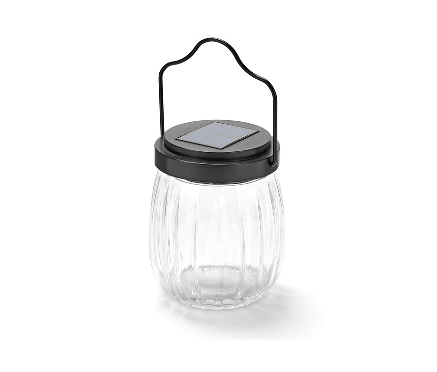 Eine Glas-Solarleuchte mit schwarzem Griff.
