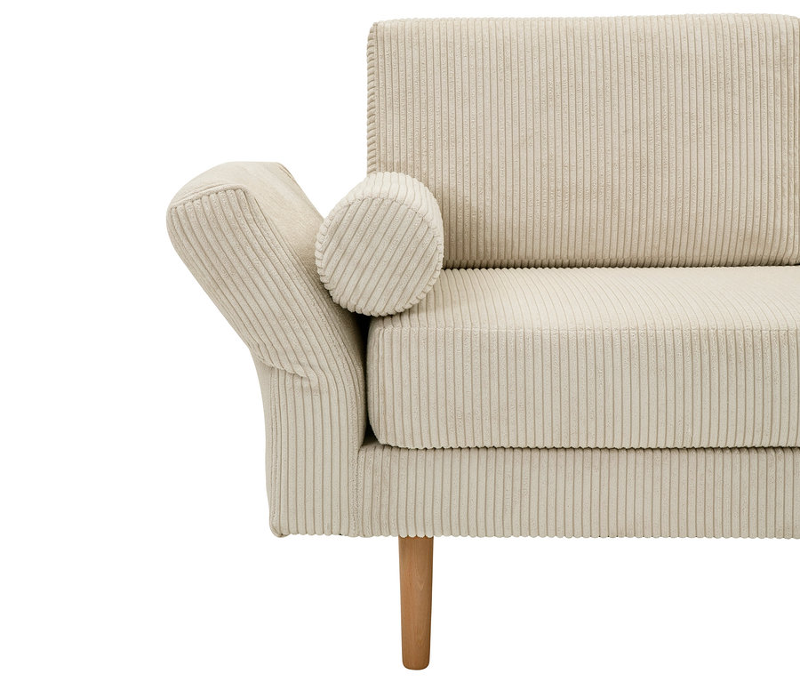 Detail der beigen Cord-Recamiere »Ivo« links.