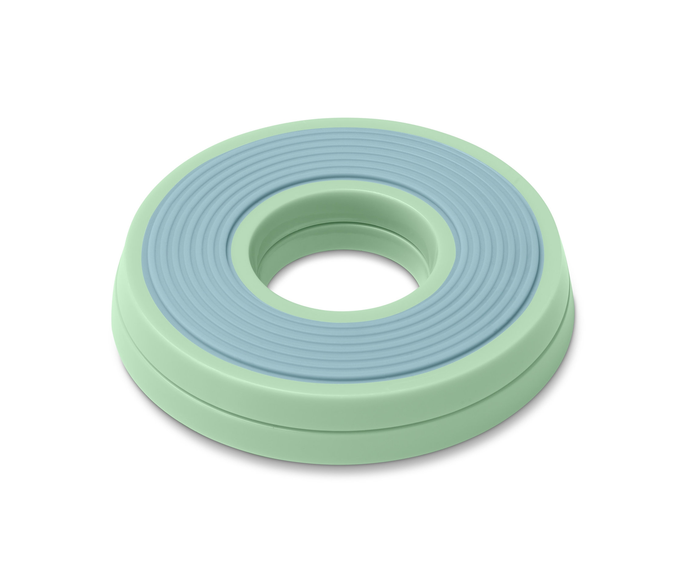 Eine grüne Torten-Drehscheibe.