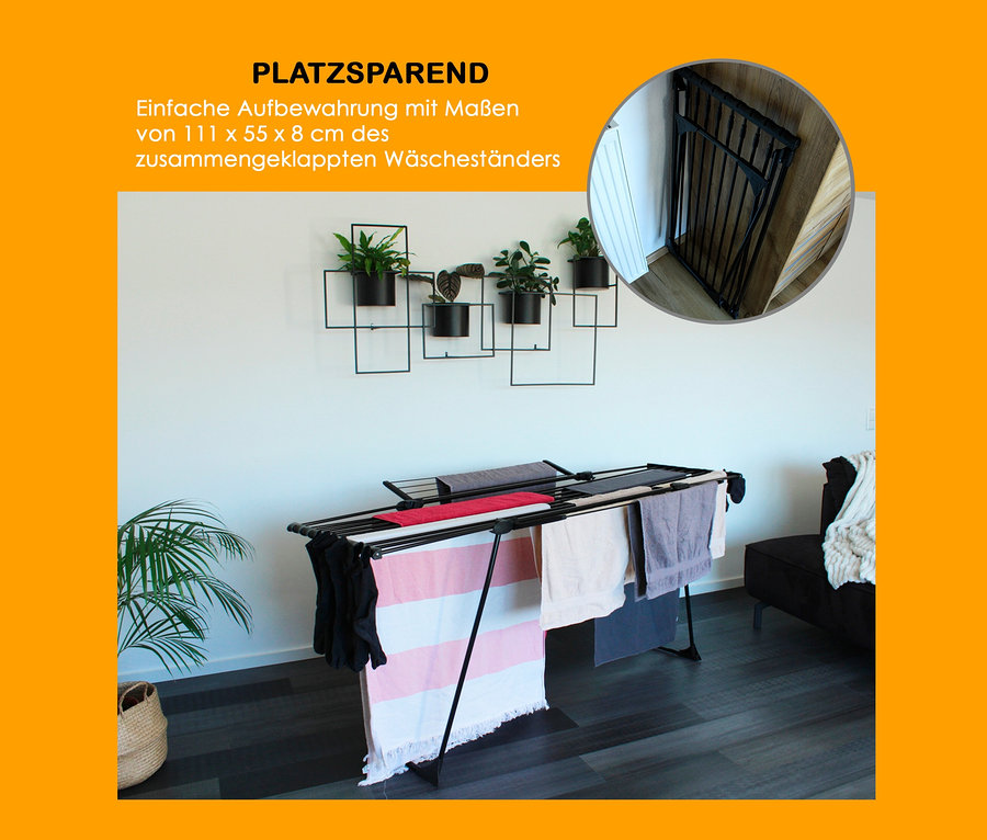 Schwarzer Teleskop-Wäscheständer »Ultra« mit Handtüchern im Innenraum.