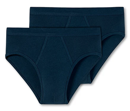 Zwei marineblaue SCHIESSER Sportslips liegen übereinander.