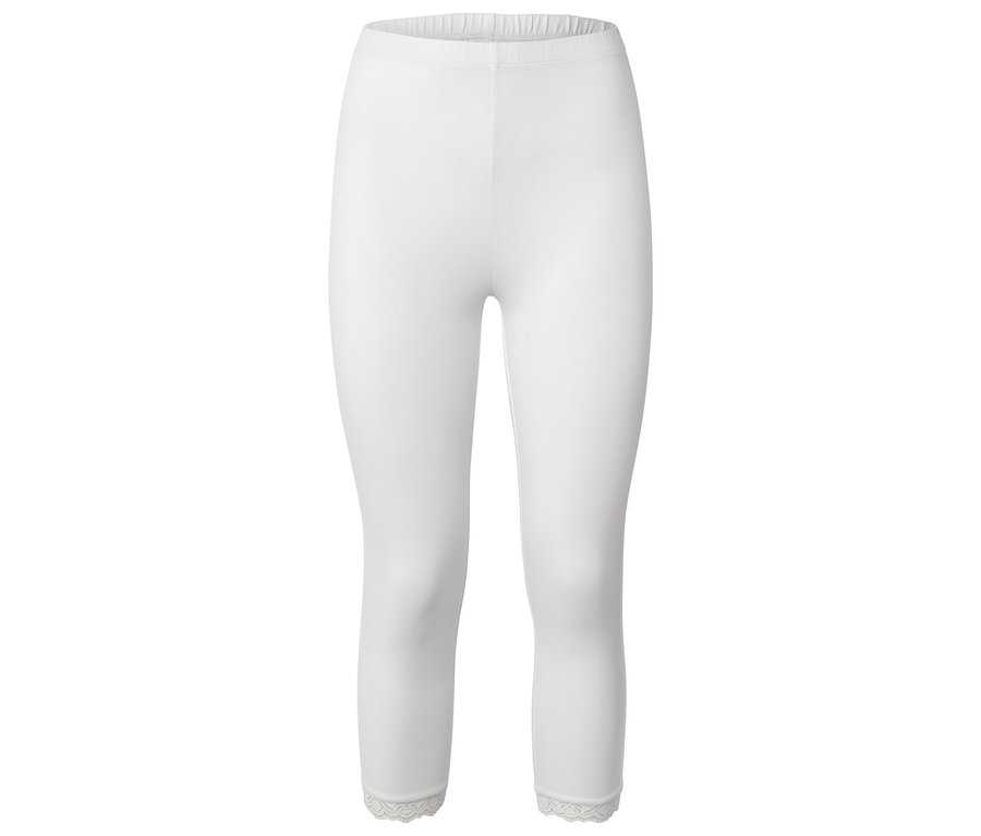 Weiße Leggings mit Spitzenbesatz am Saum.