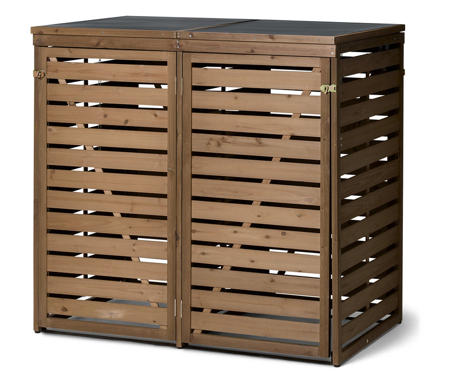 Ein doppelter, brauner Mülltonnenbox aus Holz mit horizontalen Latten und einem schwarzen Deckel steht auf dem Boden.