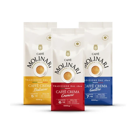 Drei Packungen Caffè Molinari Kaffee in verschiedenen Farben, darunter eine Packung Caffè Molinari Caffè Crema Probierset - Ganze Bohne.