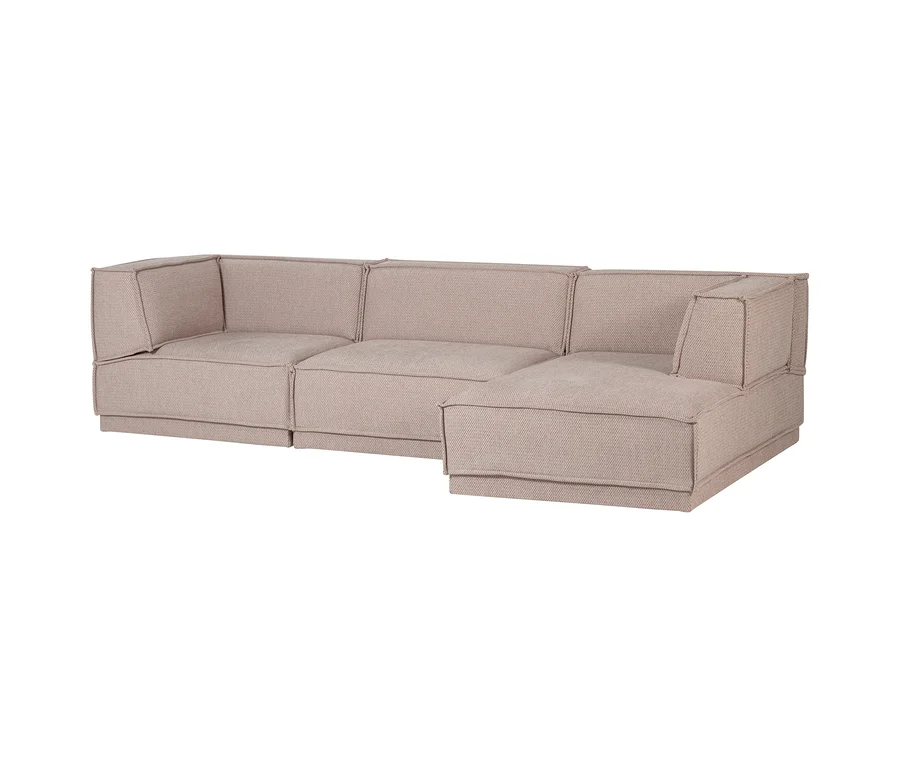 Modulares L-förmiges Sofa in Hellbeige mit strukturierter Stoffoberfläche und Chaiselongue auf der rechten Seite.