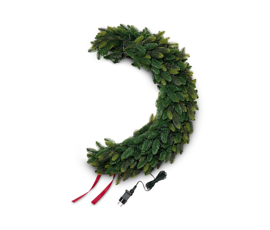 Halbmondförmiger XL-LED-Dekokranz in Grün mit roten Bändern und Kabel mit Stecker.