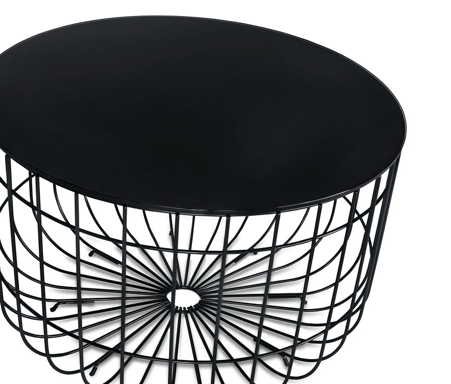 Detailansicht eines runden schwarzen Couchtischs mit Glasplatte.