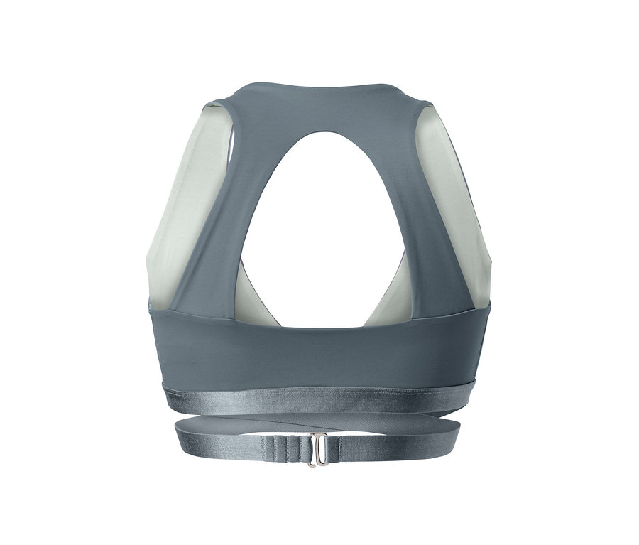 Detailansicht eines grauen Sport-Bustiers mit Zierband.