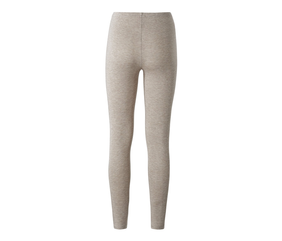 Beige Leggings auf weißem Hintergrund.