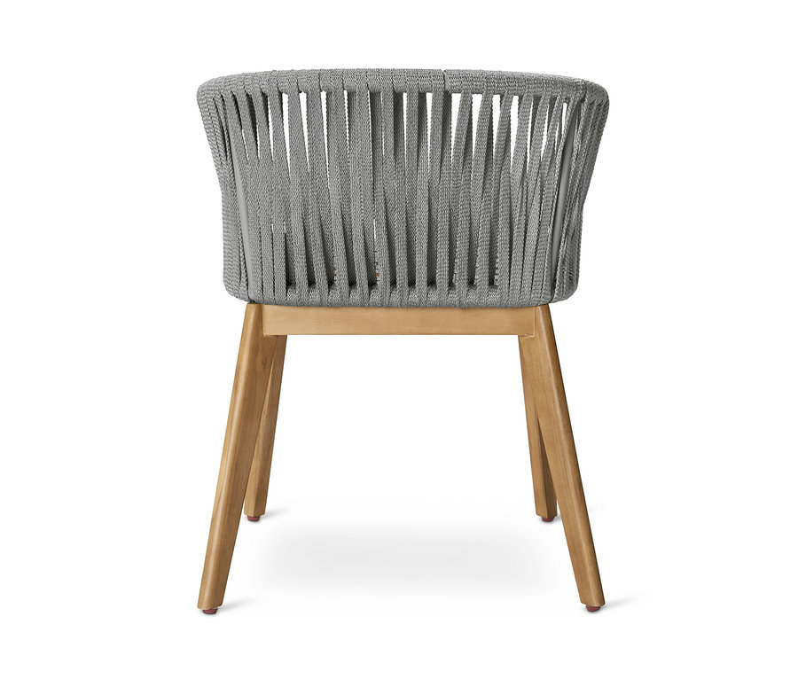 Rückansicht eines Dining-Sessels mit Textilgeflecht und Holzbeinen.