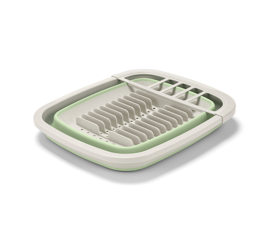 Ein faltbares Abtropfgestell in Hellgrün und Creme.