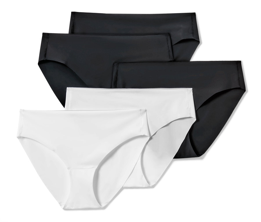 Vier Magic-Cut-Slips, 5 Stück, zwei schwarze und zwei weiße, liegen übereinander.