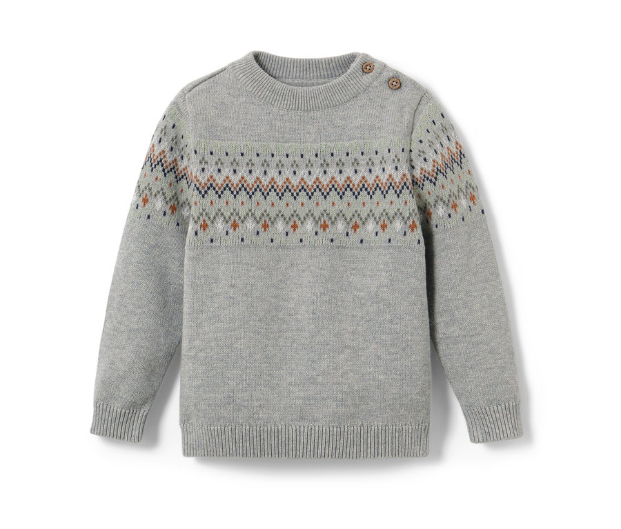 Ein grauer Kinder-Strickpullover mit Norwegermuster.