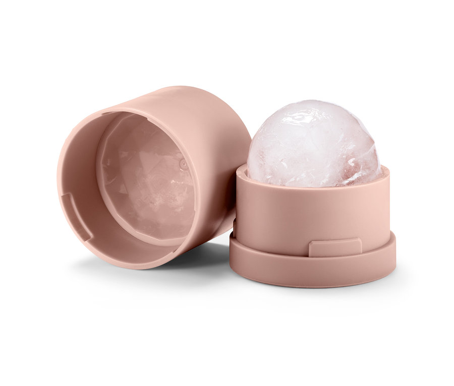 Eis-Gesichtsbehandlung in rosa Halterung, daneben der Deckel.