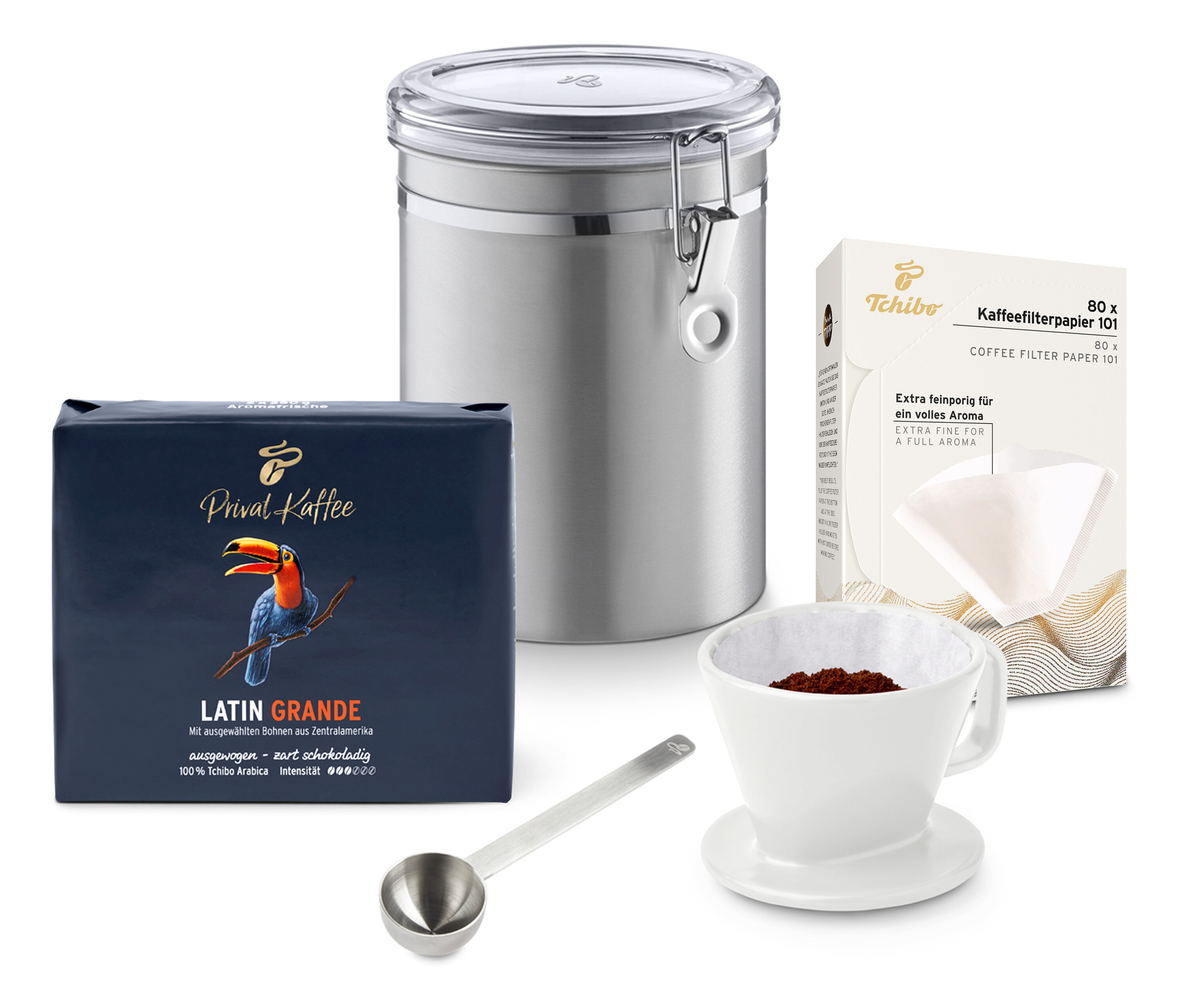 Kaffeezubereitungsset: Kaffeepackung, Edelstahlbehälter, Filter, Papierfilter und Löffel.