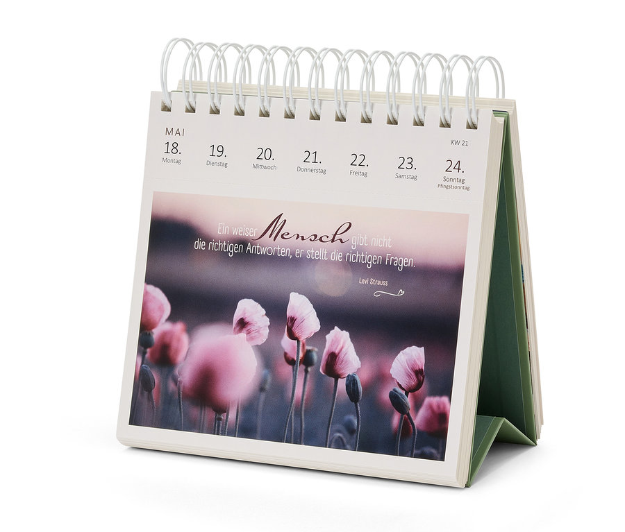 Tischkalender mit Blumenmotiv und Zitat.