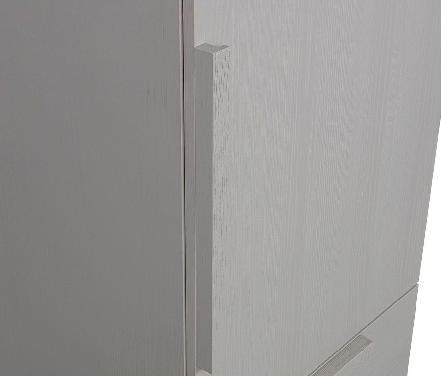 Detailansicht eines grauen Woood Rens Schranks mit einer Schublade und einer Tür.