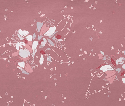 Detailaufnahme von rosafarbener Jersey-Bettwäsche in Normalgröße mit Blumenmuster.