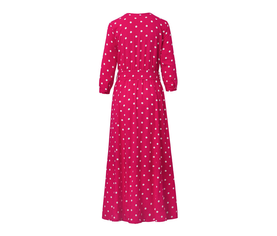 Detailansicht eines pinkfarbenen Gepunktetes Kleid in Wickeloptik mit langen Ärmeln und Gürtel.