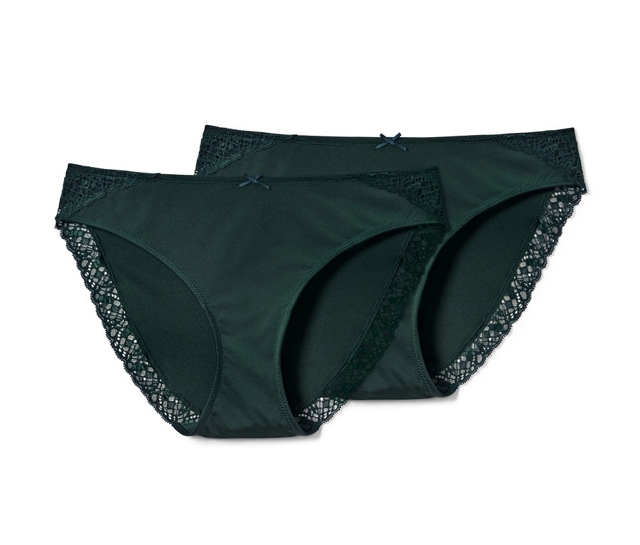 Zwei dunkelgrüne Jazzpants mit Spitze.