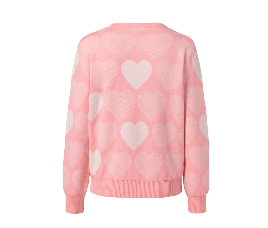 Rosa Pullover mit Herzmuster.