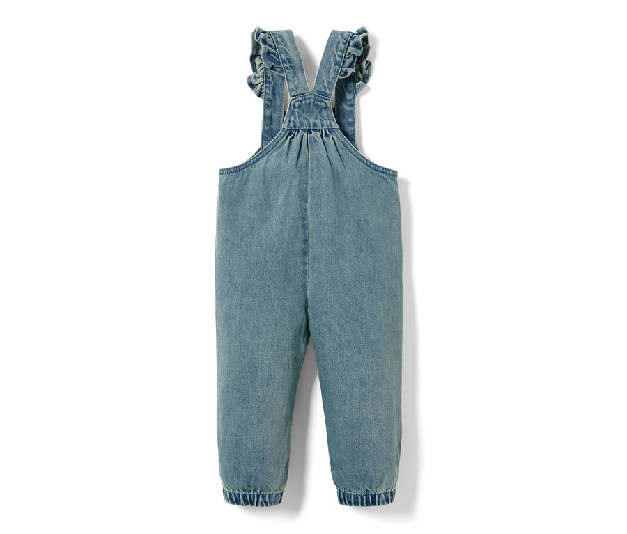 Blaue Denim-Latzhose mit Rüschen an den Trägern.