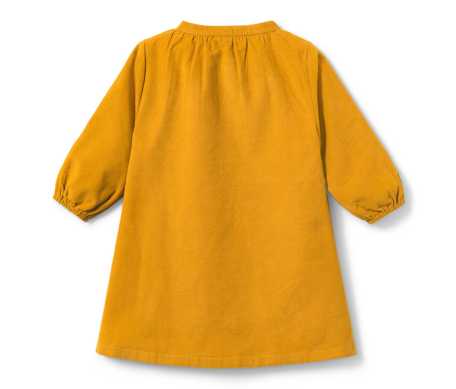 Gelbes Cordkleid mit langen Ärmeln.