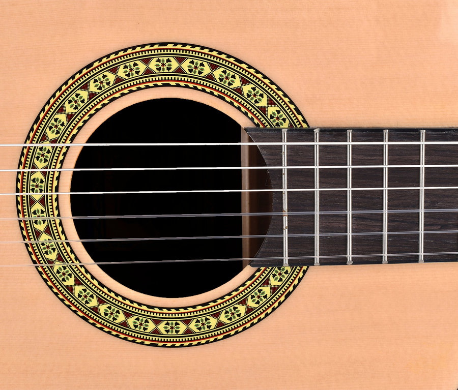 Detailaufnahme einer Voggenreiter VOLT Akustik Gitarre 4/4.
