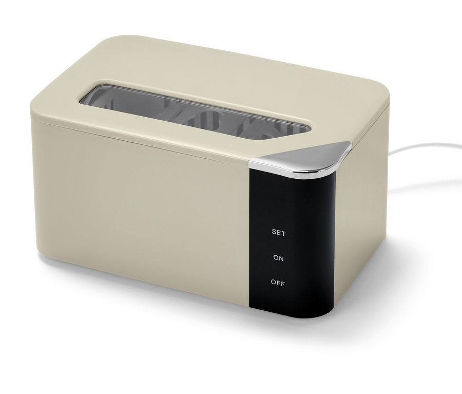 Beiger Ultraschallreiniger mit schwarzem Bedienfeld.