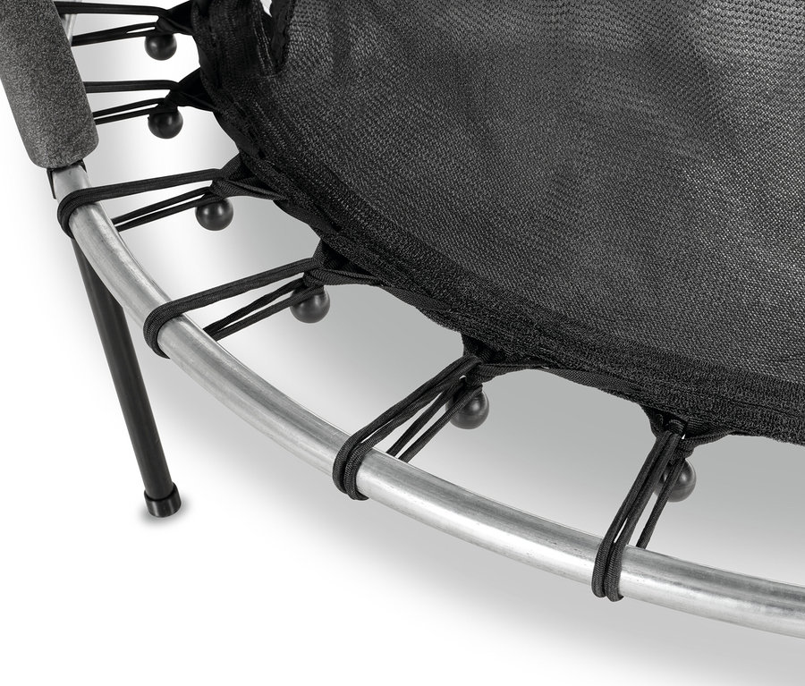 Detailaufnahme eines EXIT Tiggy Junior Trampolins mit schwarzem Sicherheitsnetz.