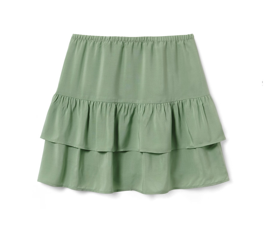 Ein grüner Kinder-Stufenrock.