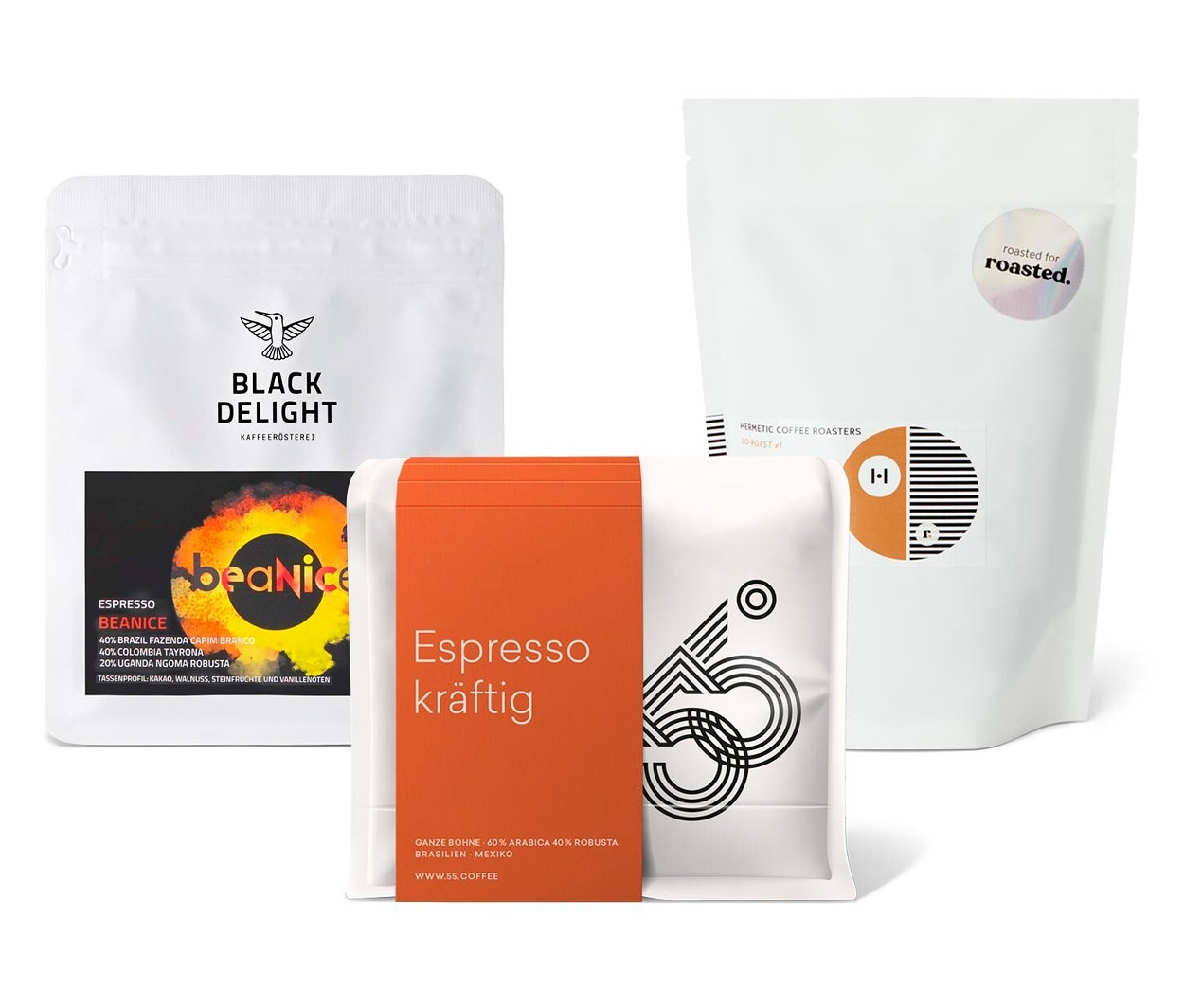 Drei Kaffeepackungen: Black Delight, Espresso kräftig und Hermetic Coffee Roasters. Das Espresso Probierpaket "Hamburger Gemisch" - 3x 250 g Ganze Bohne ist enthalten.