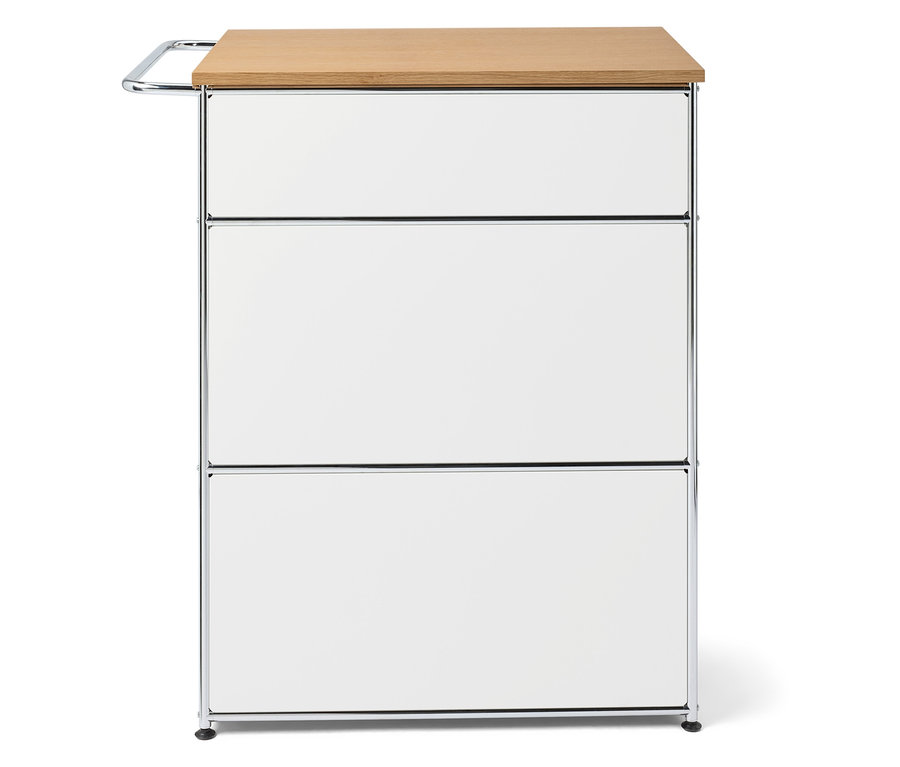 Weißes Aufbewahrungselement mit drei Schubladen und heller Holzplatte.