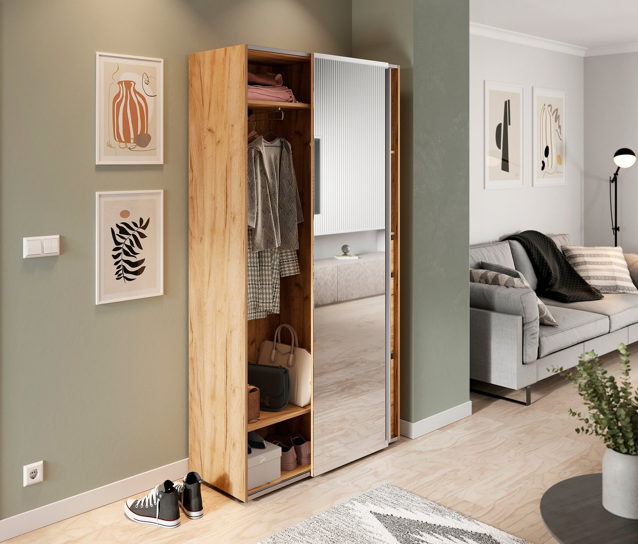 Offene Kompaktgarderobe »Aledo« mit Kleidung, Taschen und Schuhen. Daneben hängen zwei gerahmte Bilder an der Wand.