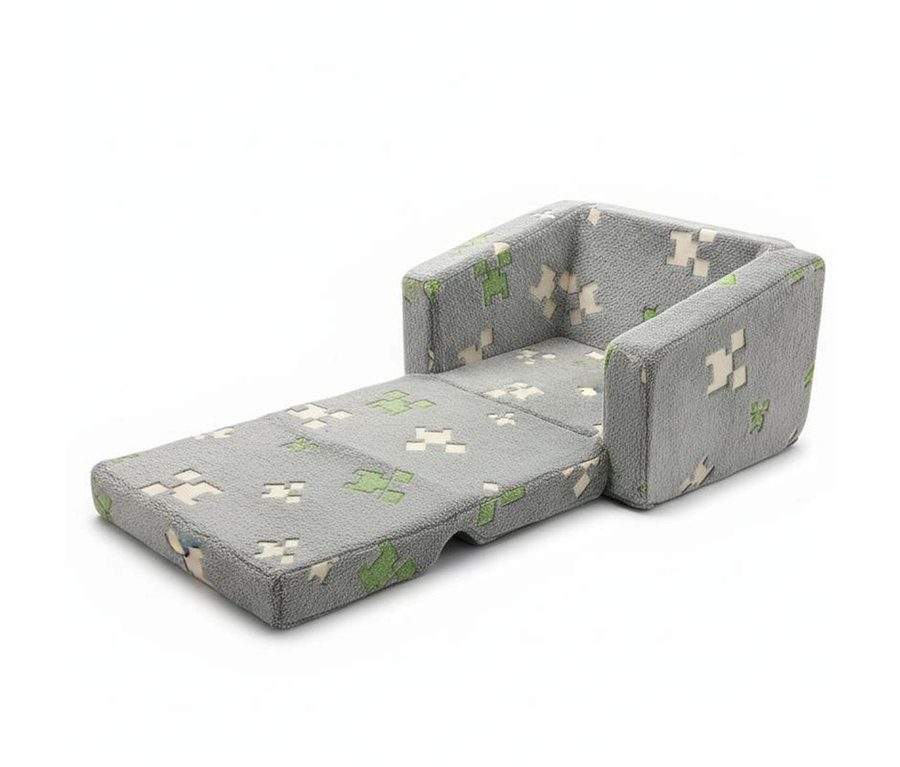 Graues Kinder-Schlafsofa, teilweise ausgeklappt, mit grünen und hellgrauen Pixelmustern.