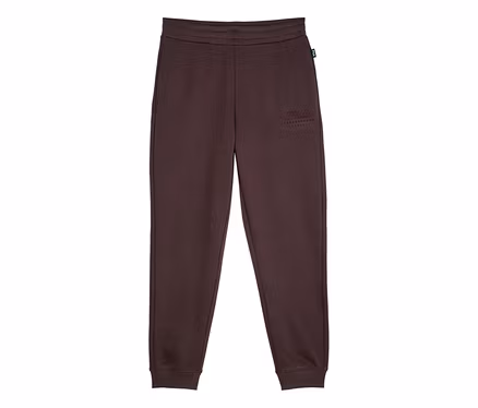 Dunkelbraune Jogginghose mit elastischem Bund und gerippten Bündchen, mit einem gestickten „FILA ESTABLISHED 1911“-Logo am linken Oberschenkel.
