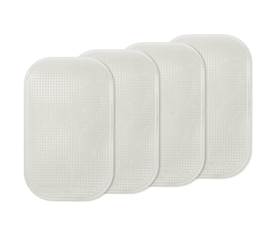 Vier Teppich-Antirutsch-Pads.