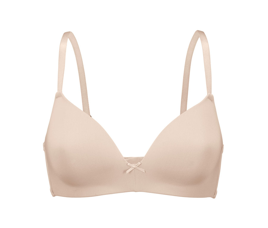 Ein hautfarbener Softschalen-BH vor einem weißen Hintergrund.
