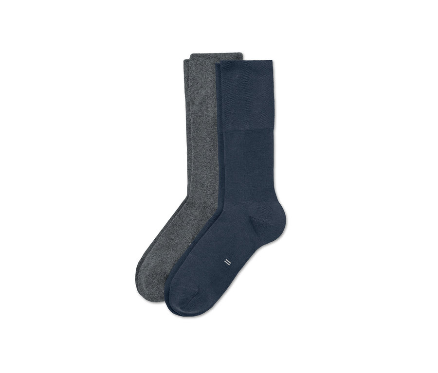 Zwei Paar Diabetikersocken, ein Paar grau und ein Paar dunkelblau.