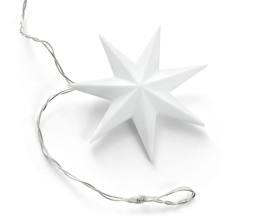 Eine weiße LED-Akku-Lichterkette »Sterne« liegt auf einem weißen Hintergrund.