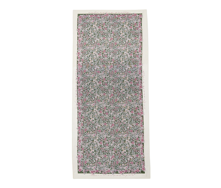 Detailansicht eines floralen Webschals.